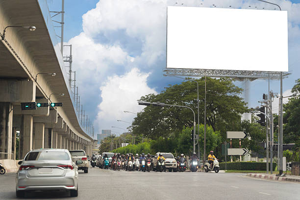 istock A blank billboard on one of Thailand's streets, a blank billboard with copy space for text or content. 2211537238