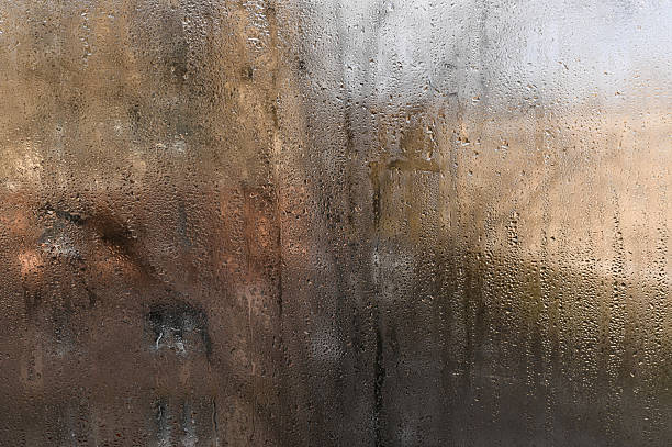 istock Condensation on the glass. wet window. 2211540589