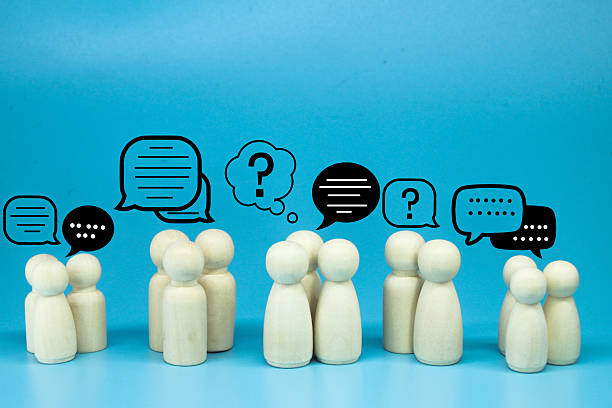istock peg doll with message notification icon, chat social media interaction. 2211541518