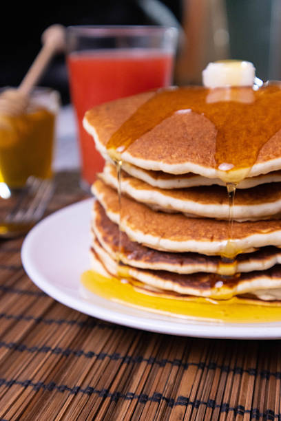 istock Pancake breakfast with honey and granola 2211549790