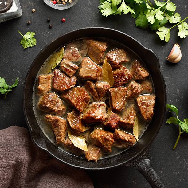 istock Braised beef in cast iron skillet 2211554968