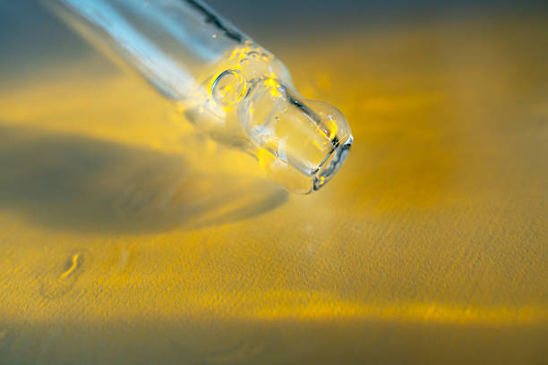 istock Pipette with essential oil on blurred background 2211554972