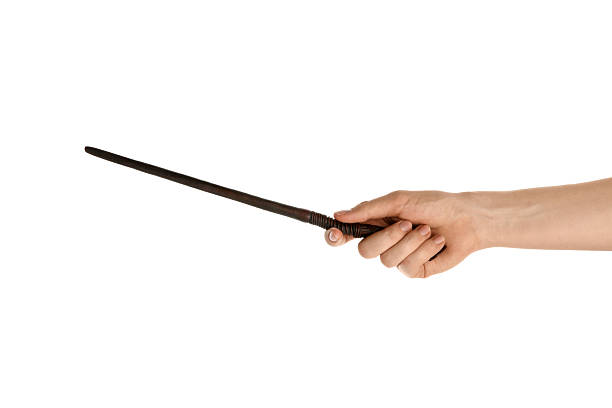 istock Woman with magic wand on white background, closeup 2211560127
