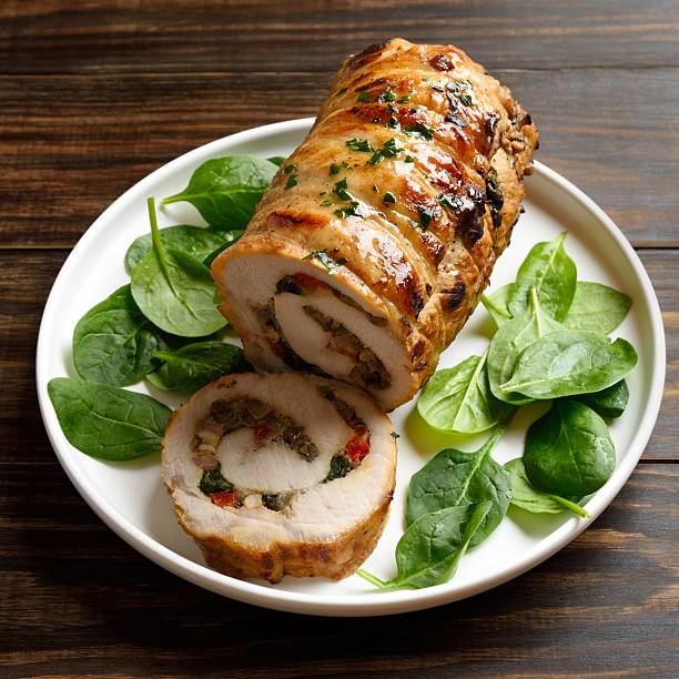 Roasted pork roll stuffed with mushroooms, onion, red bell pepper, spinach