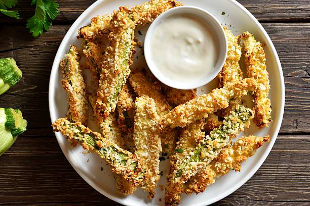 istock Crunchy zucchini breaded sticks with dip sauce 2211564684