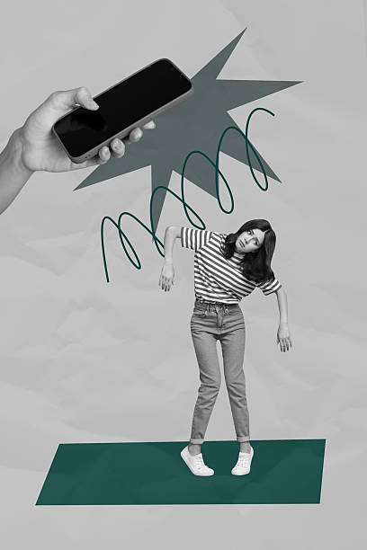istock Pop collage of person marionette under gadget with spot light over grey background 2211564886