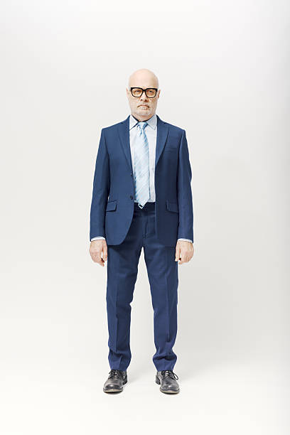 Corporate businessman standing and waiting. Front view, business and finance concept