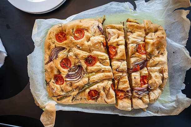 Stockholm, Sweden Freshly-baked focaccia bread on wax paper