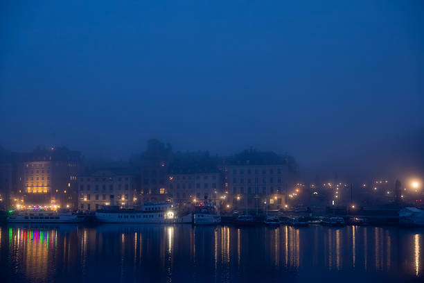 Stockholm, Sweden A view of Gamla Stan at night in the fog.