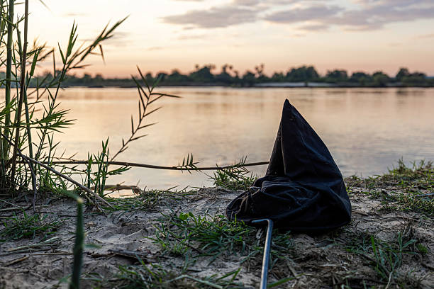 Fisherman perusing hobby on a local lake in Chorley, Lancashire,uk.