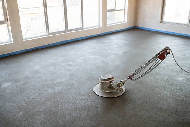 A smooth finish being applied to a commercial floor with polishing equipment