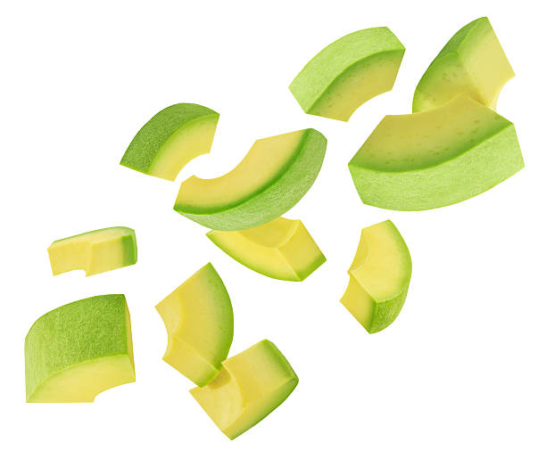 istock Levitating Avocado pieces isolated on white. Flying Avocado fruit slices. Avocado Explosion. Top view. Flat lay. Package design element 2211584839