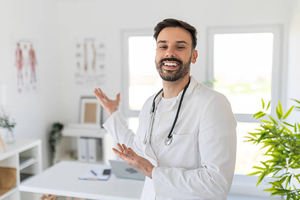istock Male Doctor Standing Proudly with Stethoscope 2211585188