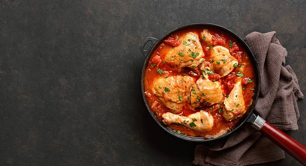 istock Georgian chicken stew with tomatoes and herbs 2211588383