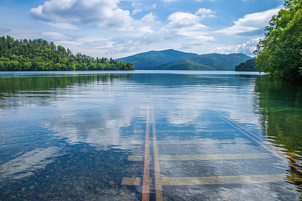 istock Lake Shikaribetsu: The railway line leading to the lake 2211602148