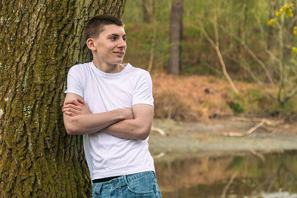 Thoughtful mid adult man at park