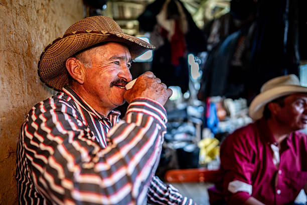 Senior man drinking coffee at home
