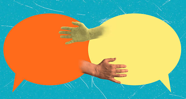 istock Creative hands engaging in conversation with colorful speech bubbles against a vibrant background 2211614718