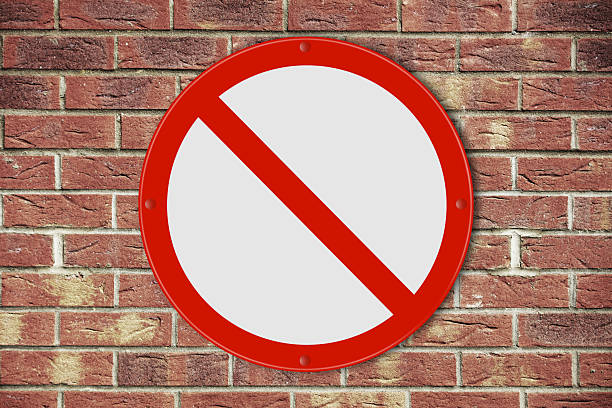 istock No entry sign on a brick wall background 2211617650