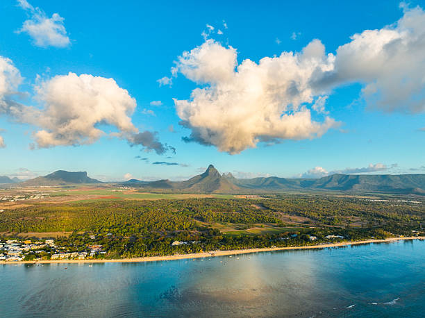 istock Coastal village and mountain peaks in Mauritius 2211617841