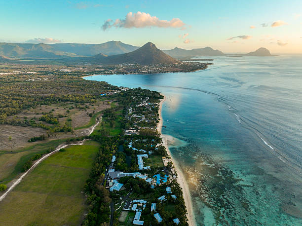 istock Scenic bay and mountain range at dusk 2211619204