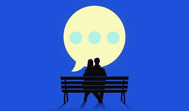 istock Couple looking at the moon in a shape of text bubble 2211622421