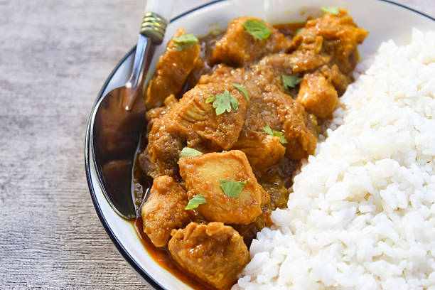 istock close up of chicken curry with rice in a plate 2211623811