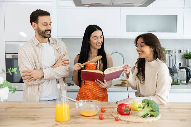 Friends Enjoy Cooking with Engaging Cookbook