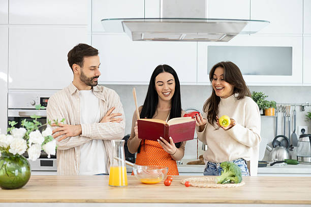 istock Cooking Friends in Cozy Kitchen Scene 2211625448