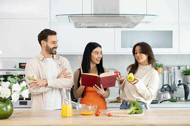 istock Friends Cooking Together with Mixed Emotions 2211625450