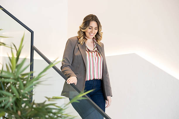 istock Professional Woman Smiling in Office 2211625551