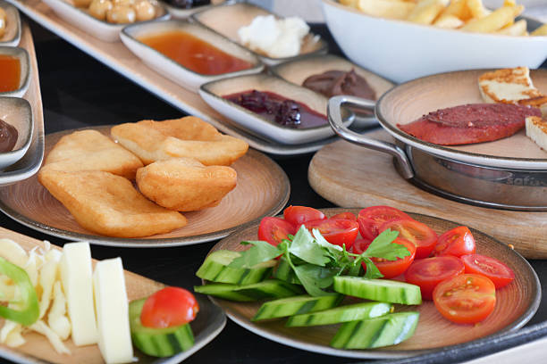 A Variety of Appetizers and Fresh Vegetables Artfully Arranged