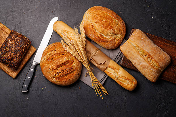 istock An assortment of freshly baked bread displayed on a table 2211634390