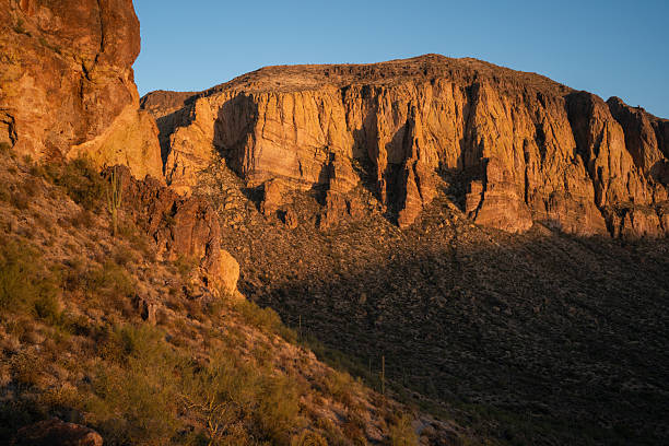 istock Sunset illuminate towering cliffs in Boulder Canyon, Arizona 2211635837