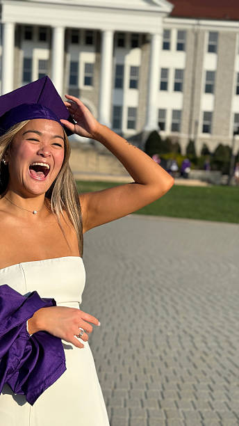 istock Graduate is full of joy on campus 2211636142