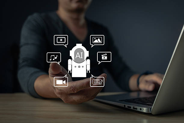 istock A person interacts with a holographic AI chatbot interface displaying icons for music, video, text, and images, symbolizing artificial intelligence's role in multimedia and communication. 2211636566
