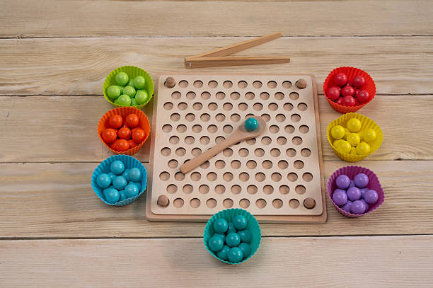 istock children's wooden educational game. Montessori 2211637163