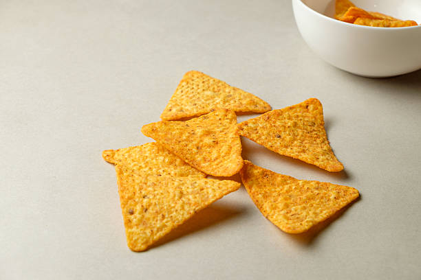 istock Crispy nacho chips ready for a flavorful snack experience at home 2211637466