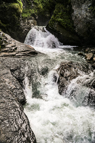 istock A Reichenbach fall in Switzerland waterfall is flowing down a rocky cliff 2211639728