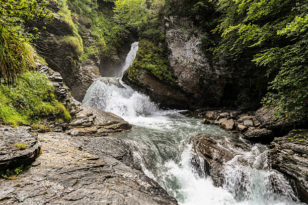 istock A Reichenbach fall in Switzerland waterfall is flowing down a rocky cliff 2211639733