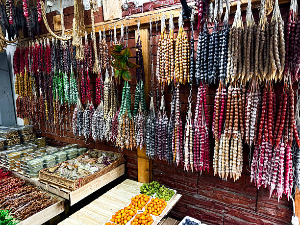 istock Colorful dried fruit and nut display in market stall 2211641172