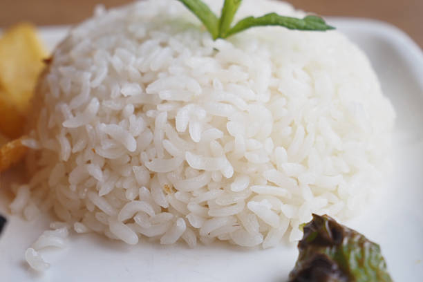 Deliciously steamed white rice, served beautifully with a variety of delightful side condiments