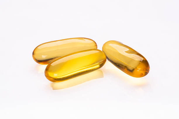 istock Dietary supplement containing omega 3 fish oil capsules 2211644440