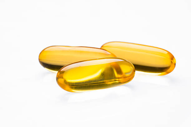 istock Dietary supplement containing omega 3 fish oil capsules 2211644462