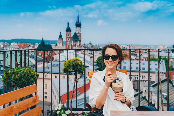 istock Woman in restaurant eating dessert 2211645570