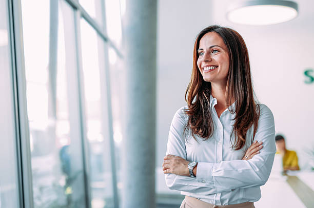 istock Confident businesswoman in modern office. 2211649034