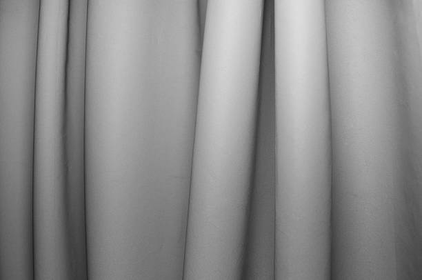 istock Fabric draping creates soft folds in monochrome tones in a serene setting 2211651004