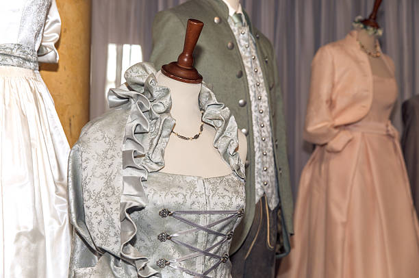istock Elegant vintage victorian dresses displayed on mannequins 2211658117