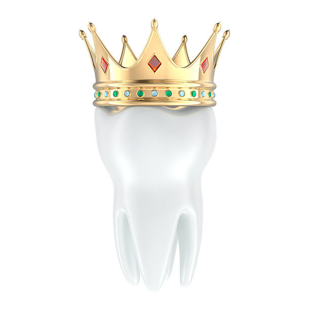 istock Molar Tooth with golden crown, premium stomatology concept. 3D rendering 2211663559