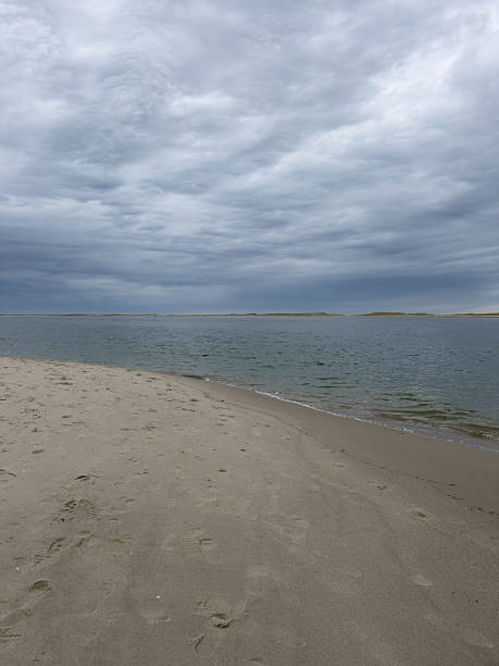 istock Ocean View on the Beach Under Cloudy Skies in Cape Cod 2211665057